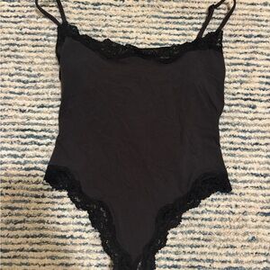 Skims black lace bodysuit